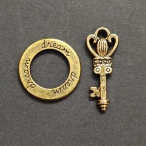 German Silver Gold Plated Metal Peace And Money Key Combo Pendant